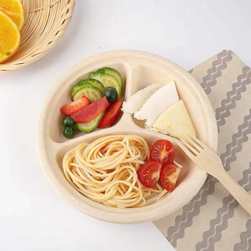 Beige bamboo fiber divided plate with pasta, vegetables, and wooden fork