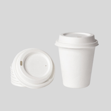 Eco-friendly bamboo and sugarcane pulp coffee cup with biodegradable lid – plastic-free, compostable, and sustainable.