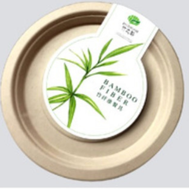 Bamboo fiber plate with eco-friendly label featuring a green bamboo design